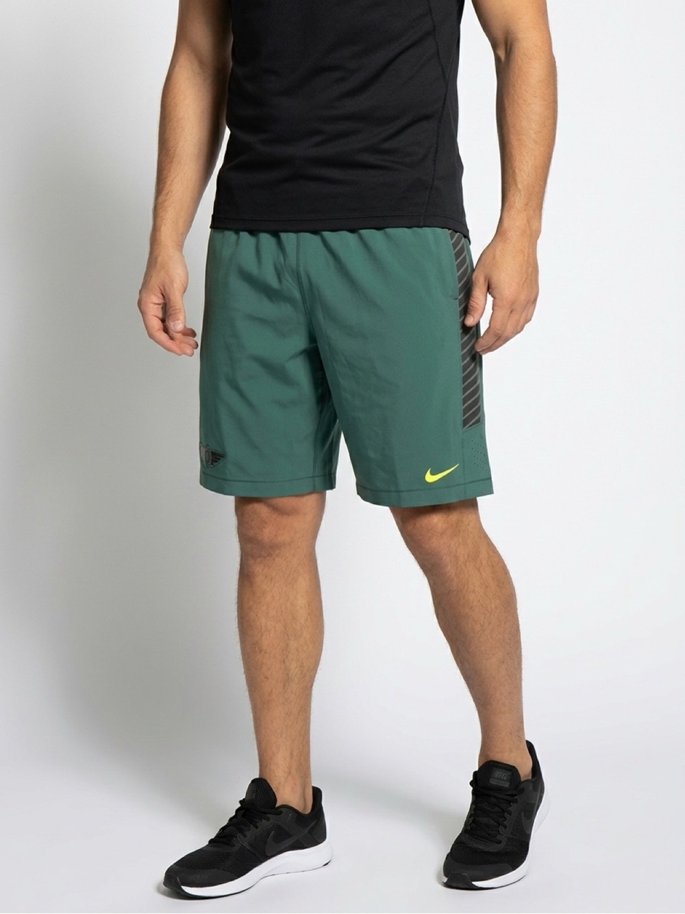 Nike Men's Oregon Ducks Dark Athletic Shorts with Neon Yellow Swoosh